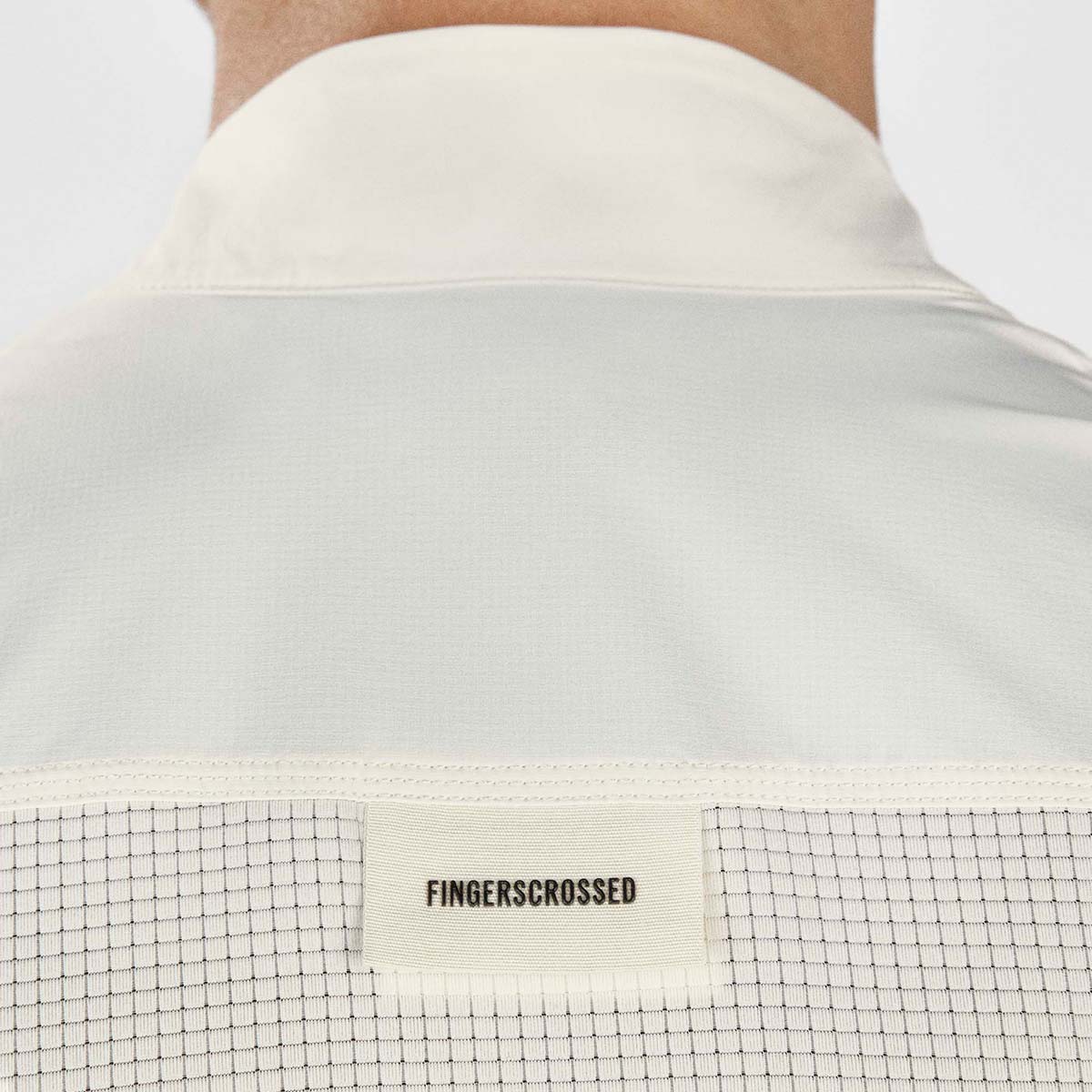 FINGERSCROSSED ROAD WIND VEST Men Weste Windbreaker Männer Radsport antique cream weiss beige FINGERSCROSSED ROAD WIND VEST Men Weste Windbreaker Männer Radsport antique cream weiss beige Detail Mesh Material Logo Rücken Nacken