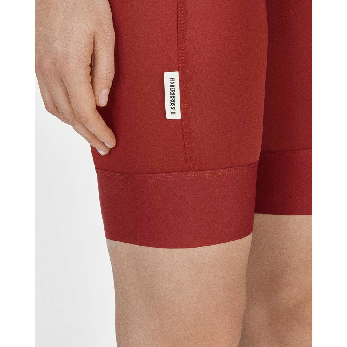 FINGERSCROSSED #ROAD BIB WOMEN Fahrradhose Damen Radsport brick rot FINGERSCROSSED #ROAD BIB WOMEN Fahrradhose Damen Radsport brick rot Detail Logo